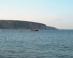 Red boat, white cliffs
